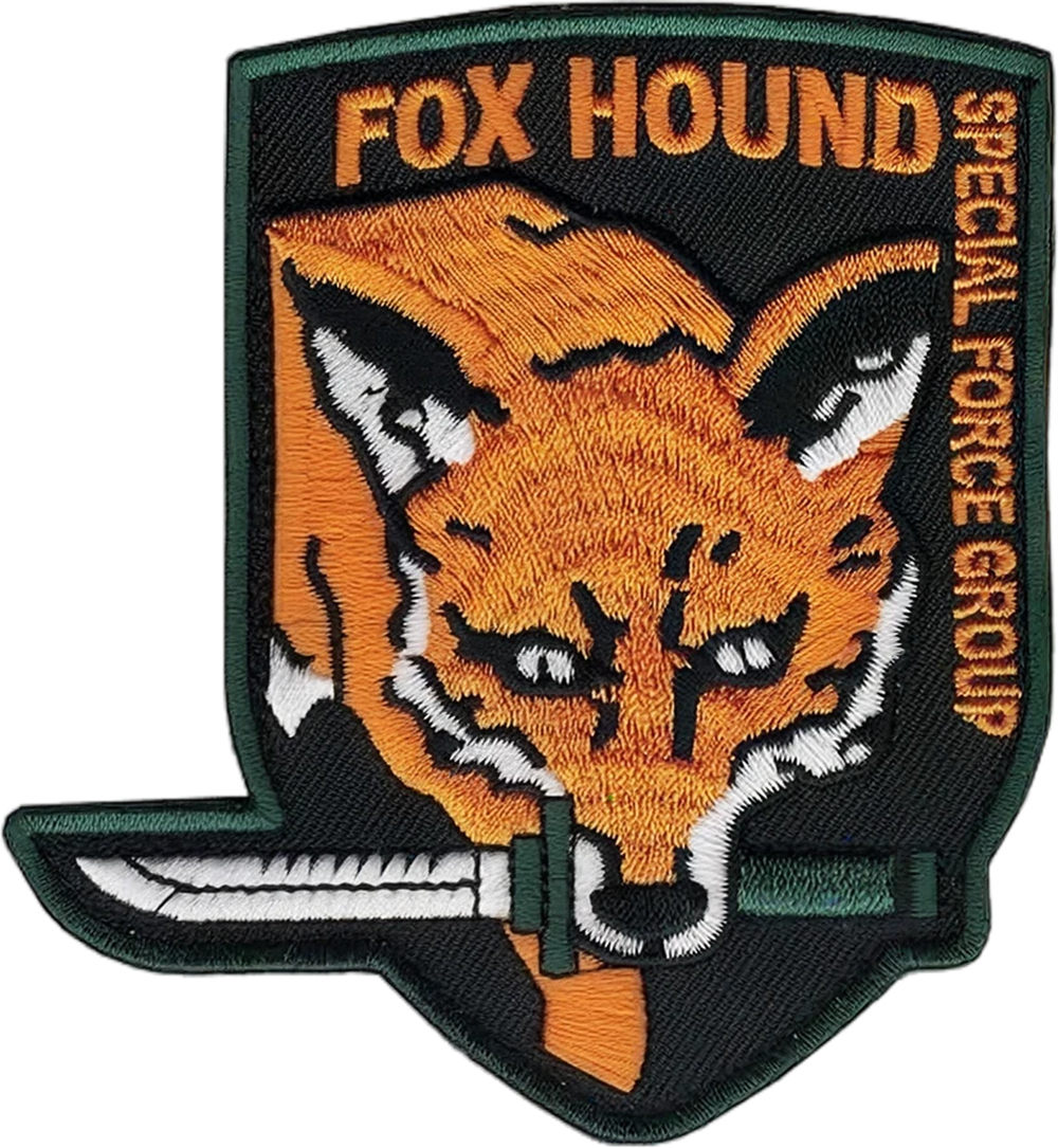 An embroidered FOXHOUND Special Force Group patch from Metal Gear Solid: a fox's head with a knife in its teeth, fixed to the board with a safety pin