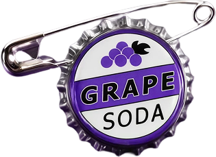 A Grape Soda bottle cap badge from Up, purple and white with a cluster of grapes and a bird, fixed to the board with its own safety pin
